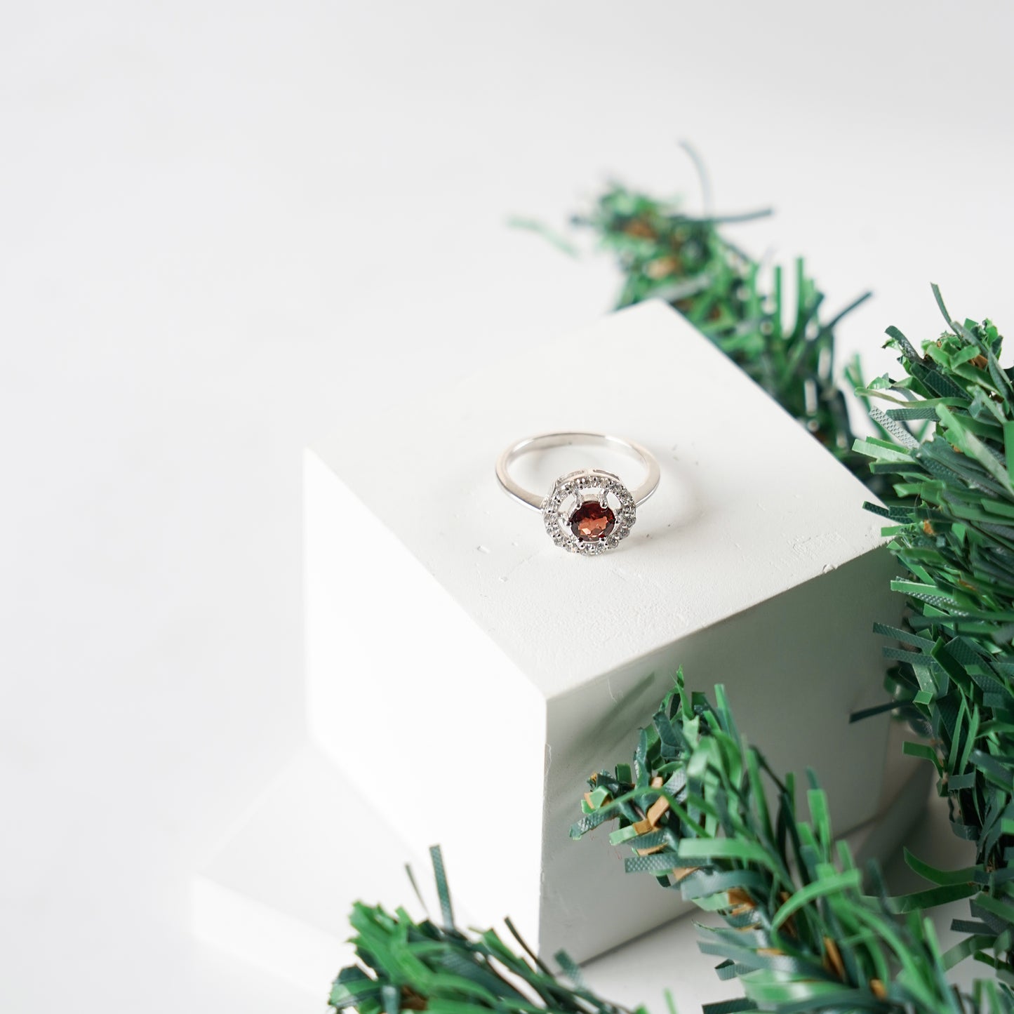 Eternal round halo garnet ring