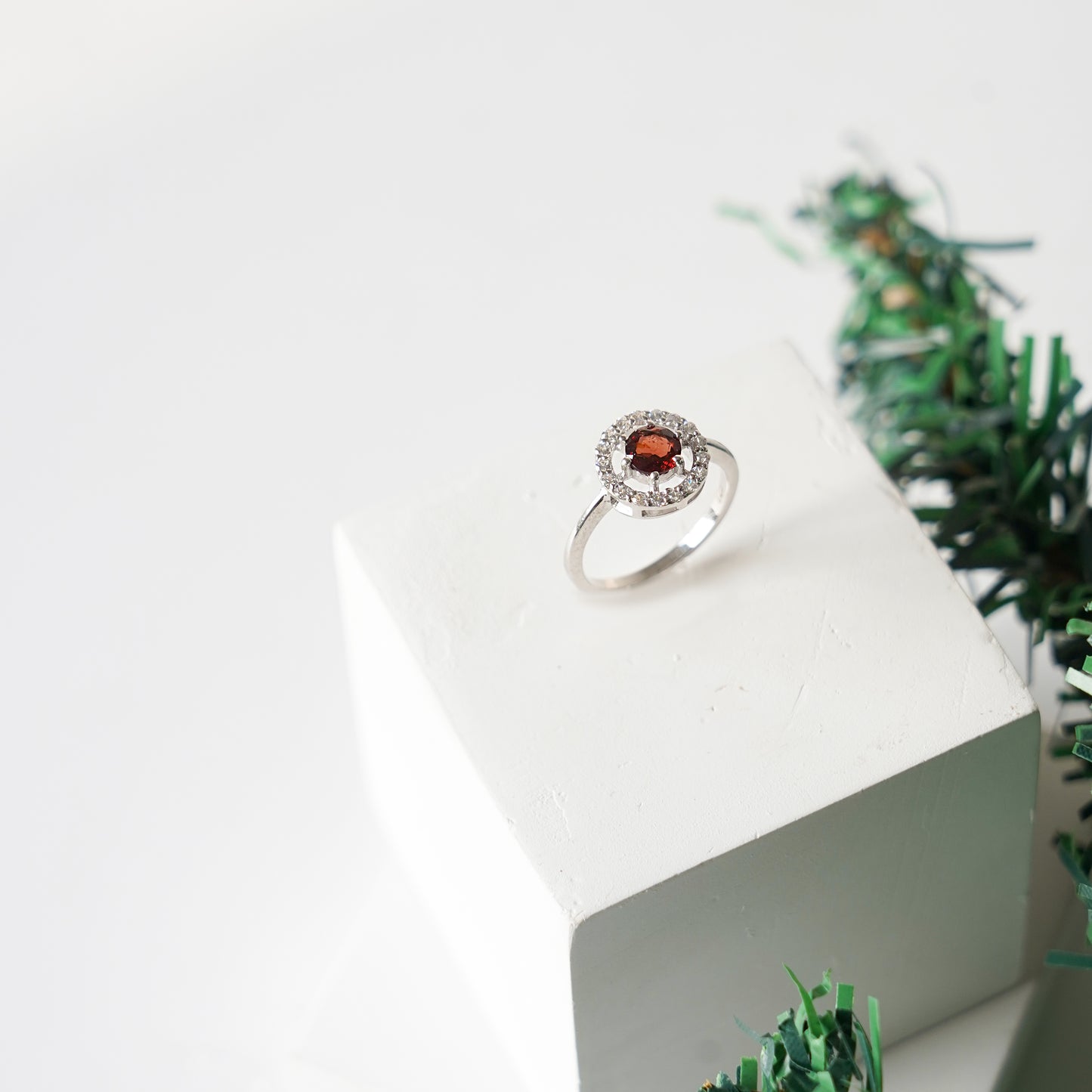 Eternal round halo garnet ring