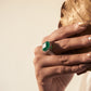 Gleaming green statement ring