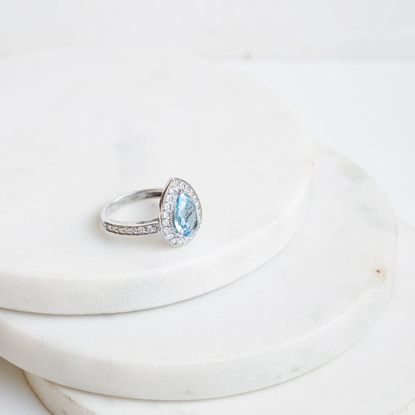 Pear of joy sky blue topaz ring