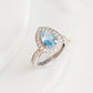 Pear of joy sky blue topaz ring